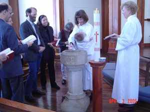 Robert's baptism at St. Lukes - photo: Steve Williams