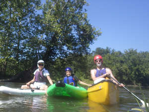 Sarah on paddleboard, Robert in ducky, David in canoe