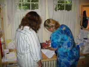 July 30, 2004: Robert's first home bath (Sarah and Doula Dawn).