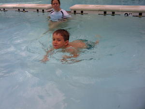 Robert swimming in apartment pool