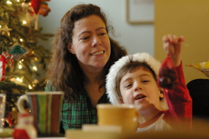 Sarah watching Robert show off a Christmas present.