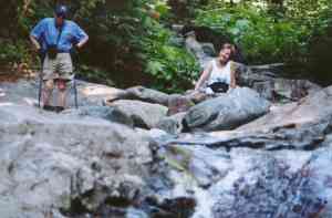 Harry and Elle relax creekside.