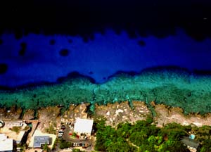 Aerial photo of Turtle Reef and Divetech by Courtney Platt, http://www.courtneyplatt.com/