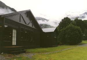 Glade House and the mountains surrounding it in the fog.