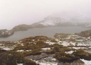 A McKinnon Pass tarn and our lovely weather.