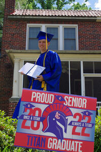 Robert in graduation regalia